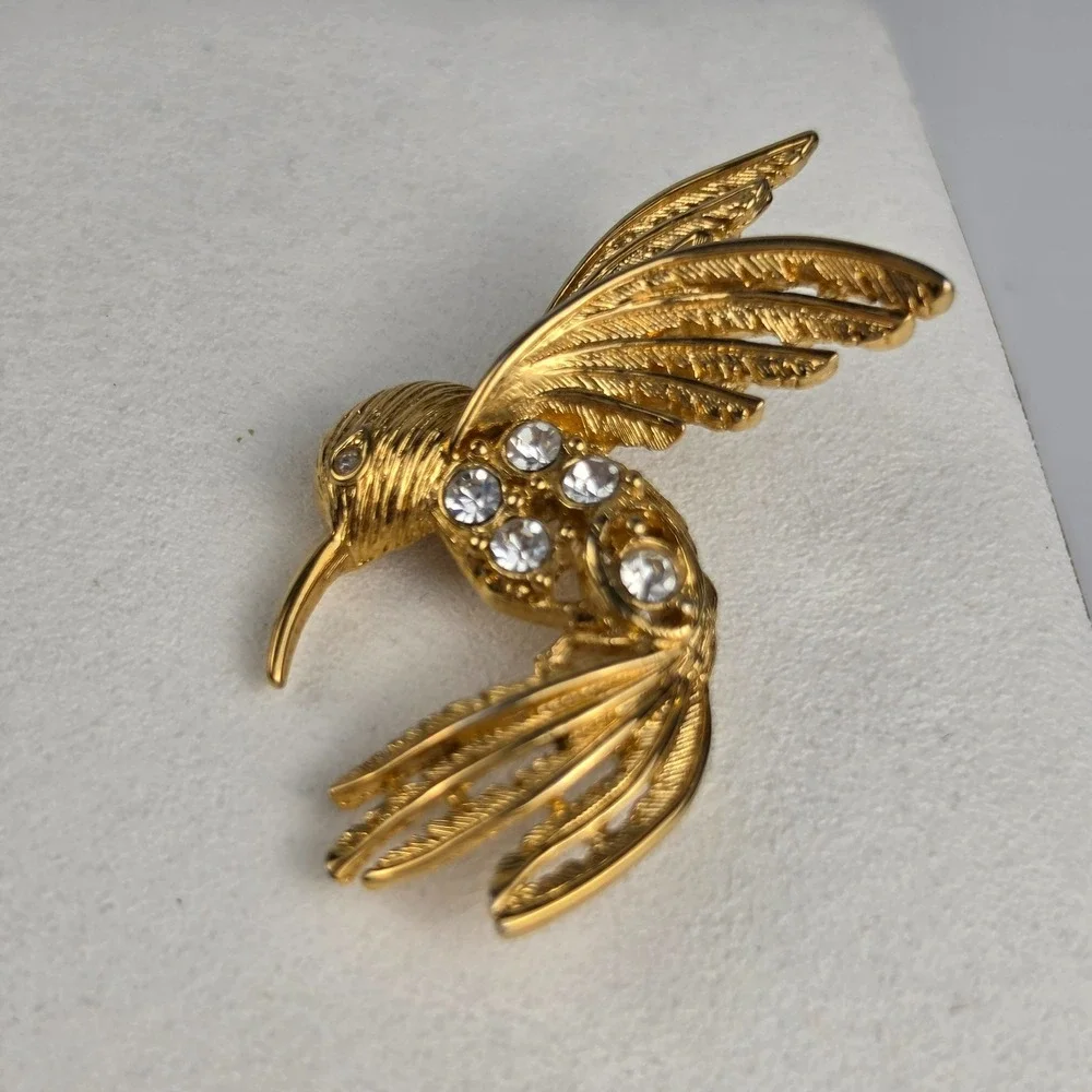 Napier Gold Tone Rhinestone Hummingbird Brooch